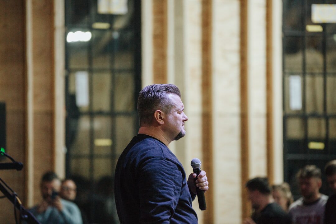 man speaking into microphone